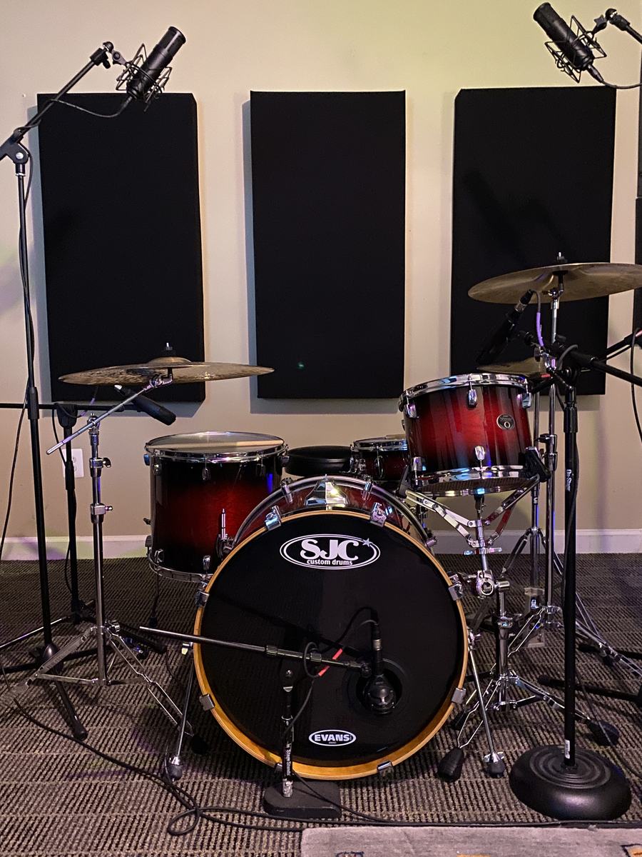 A fully miked drum kit in the treated tracking room at Empowered Recordings in Silver Spring, Maryland